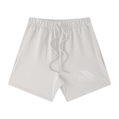 Footprint® Core essential shorts in white, unisex, made from 100% cotton, featuring an elastic waistband and branding.
