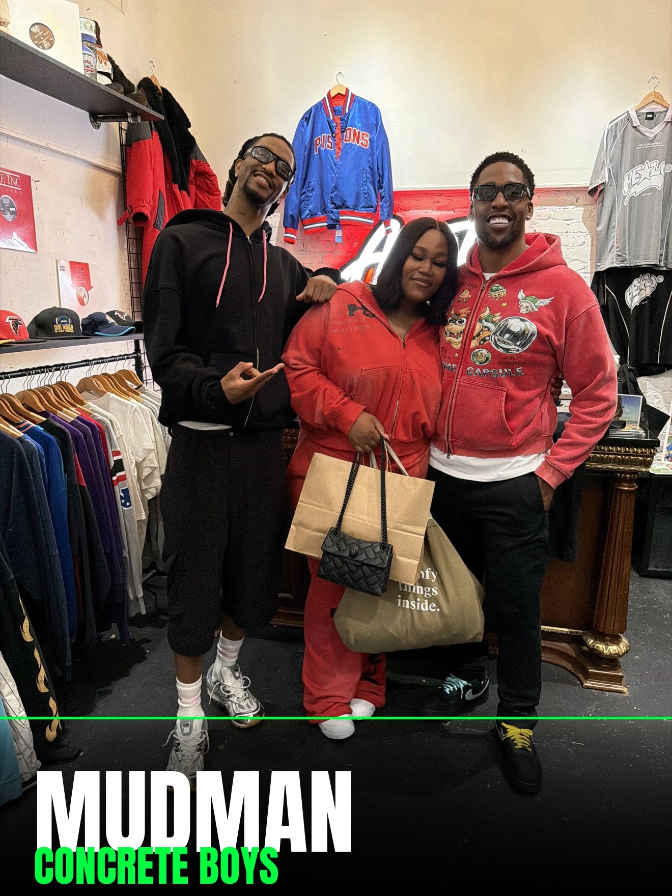 MudMan of Concrete Boys wearing Footprint Apparel in-store with crew